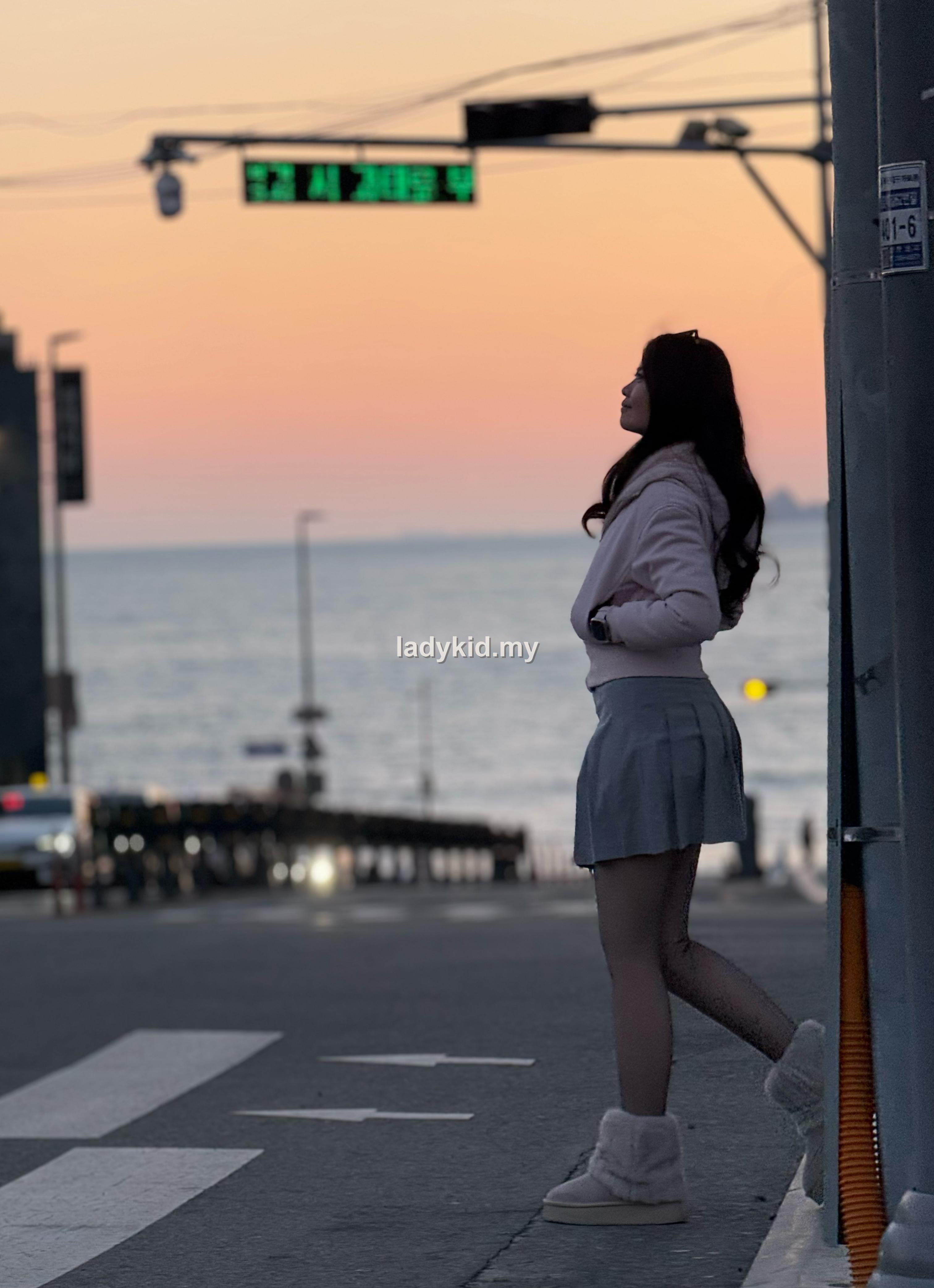 Customer sunset outfit with sheer black tights